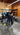 Richard Tilley and Nicole Pape standing in front of a torn down Workhorse Sabre Automatic Screen Printing Press